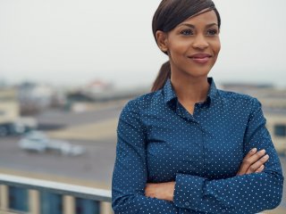 Businesswoman staring off into distance